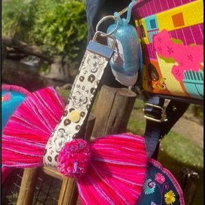 Handmade Minnie ears holder keychain in The Lion King Simba print